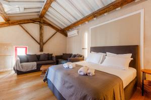 Postel nebo postele na pokoji v ubytování Danae Hotel