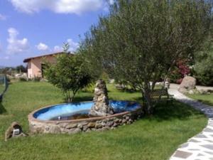 A garden outside Agriturismo S´Aranada
