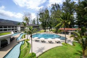 una vista aerea della piscina del resort di Amora Beach Resort Phuket a Bang Tao Beach