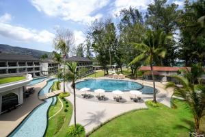 an aerial view of the pool at the resort at Amora Beach Resort Phuket - SHA Extra Plus in Bang Tao Beach