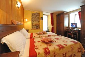 Letto o letti in una camera di L'Ancien Paquier Chambre D'Hotes