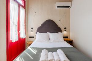 Postel nebo postele na pokoji v ubytování Danae Hotel