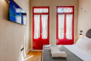 Postel nebo postele na pokoji v ubytování Danae Hotel