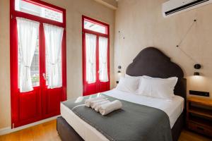 Postel nebo postele na pokoji v ubytování Danae Hotel