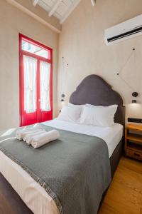 Postel nebo postele na pokoji v ubytování Danae Hotel