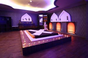 A bed or beds in a room at Suhan Cappadocia Hotel & Spa