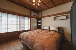 Voodi või voodid majutusasutuse 城下の宿　燈 toas