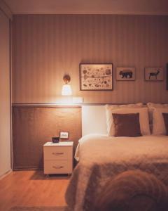מיטה או מיטות בחדר ב-Sedra House