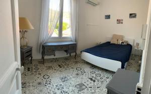 Posteľ alebo postele v izbe v ubytovaní Jolie, cozy, confortable maison de ville au calme à 5min du centre de Verdun, parking devant la maison