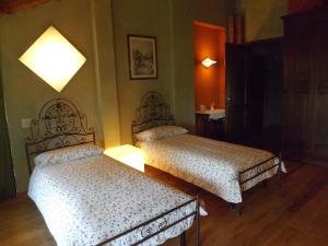 Posteľ alebo postele v izbe v ubytovaní Guest house Cascina Belsito