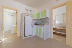 Кухня или мини-кухня в Cava Li Santi Residence
