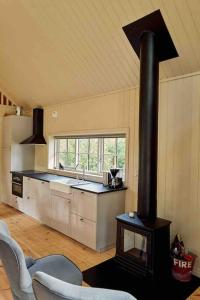 Kuchyň nebo kuchyňský kout v ubytování Agundaborg Lake Cottage + 27 fotografií