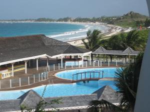 a view of the beach from a resort at Studio 03 vue mer Orient Bay in Orient Bay
