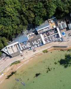 an overhead view of a beach and a building at Leeward Lodge in Totland