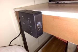 a black router sitting on top of a desk at Luxury Double room in Williamsburg Ground floor Apartment near Subway in Brooklyn