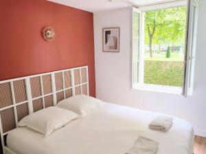 Ένα ή περισσότερα κρεβάτια σε δωμάτιο στο Cocon de Charme en Hyper centre