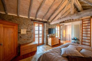 Postel nebo postele na pokoji v ubytování Rustico-Ferienhaus Dolce Vita