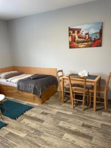 Postel nebo postele na pokoji v ubytování Apartmány Andělská