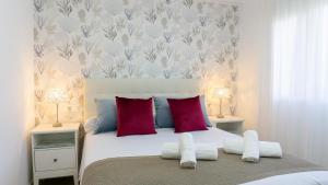 Ένα ή περισσότερα κρεβάτια σε δωμάτιο στο Luxury Apartment Torremolinos +36 φωτογραφίες