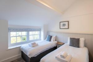 Cama ou camas em um quarto em Tregenna Castle Resort