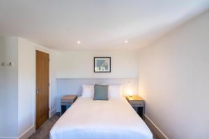 Cama ou camas em um quarto em Tregenna Castle Resort