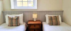 Cama ou camas em um quarto em Tregenna Castle Resort