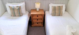 Cama ou camas em um quarto em Tregenna Castle Resort