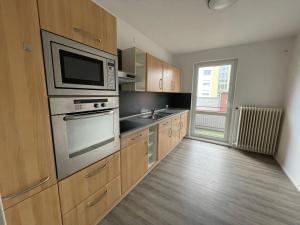 Η κουζίνα ή μικρή κουζίνα στο Schöne einfache Ferienwohnungen in Wilhelmshaven