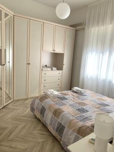 Postel nebo postele na pokoji v ubytování RESIDENZA LETIZIA