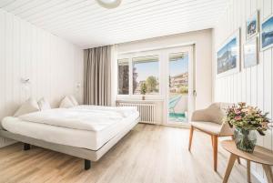 Postel nebo postele na pokoji v ubytování Wanderlust Guesthouse + 37 fotografií