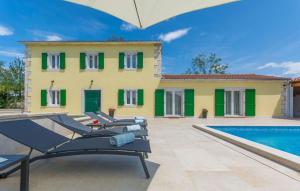 Πισίνα στο ή κοντά στο Family villa Corticum Otium with pool in Tinjan