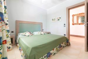 Ein Bett oder Betten in einem Zimmer der Unterkunft Villa Bianca by Perle di Puglia