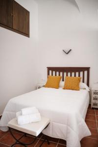Giường trong phòng chung tại VIVE Trujillo