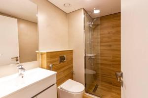 Koupelna v ubytování Raha lofts duplex 2 bedrooms
