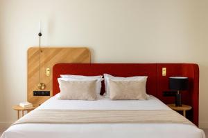 Postel nebo postele na pokoji v ubytování Le Plessis Grand Hotel