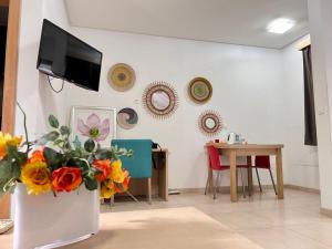 Uma TV ou centro de entretenimento em Residence ACHENBACH