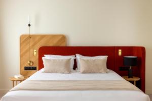 Postel nebo postele na pokoji v ubytování Le Plessis Grand Hotel