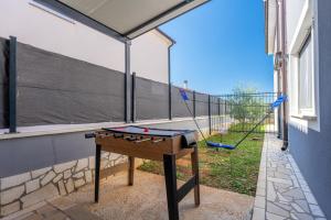 En balkon eller terrasse på Holiday house Gracijela