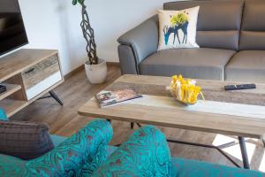 Ruang duduk di Hochalmbahnen Chalets Rauris 1-03 Maislaufeldweg 1c