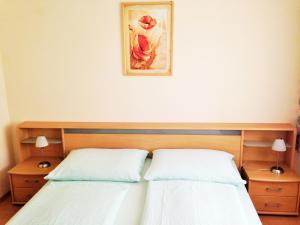 Postel nebo postele na pokoji v ubytování Nikolaushof
