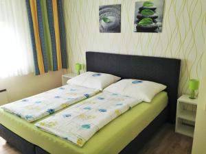 Postel nebo postele na pokoji v ubytování Nikolaushof