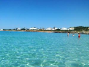 カラン・ボッシュにある2 bedrooms appartement at Ciutadella de Menorca 200 m away from the beach with shared pool and enclosed gardenの青海水泳集団