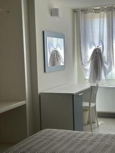 Ein Bett oder Betten in einem Zimmer der Unterkunft Palazzo dei Baroni