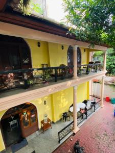 an aerial view of a house with a balcony at Ballard Bungallow in Cochin