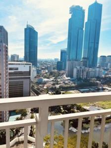 a view of a city skyline with tall buildings at Cosmo Residence “ 1 BR ” at Thamrin City in Jakarta