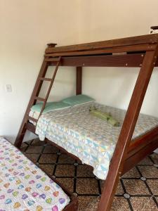 A bed or beds in a room at Pousada Sossego de Alter