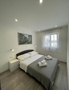 Postel nebo postele na pokoji v ubytování Villa Felicita