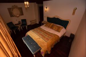 Ένα ή περισσότερα κρεβάτια σε δωμάτιο στο Arasta Konak Boutique Hotel