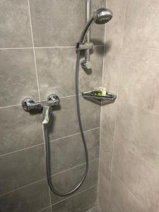 Koupelna v ubytování Apartmány Andělská + 37 fotografií