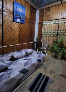 Ένα ή περισσότερα κρεβάτια σε δωμάτιο στο Serenity homestay